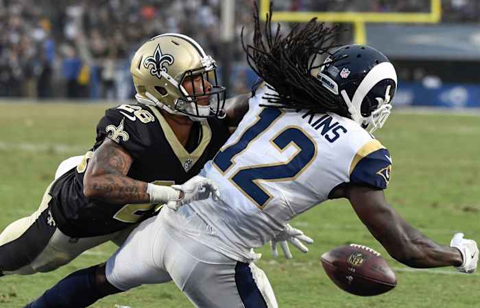 New Orleans cornerback P.J. Williams (26) breaks up a pass in the end zone to Rams receiver Sammy Watkins (12). Mandatory Credit: Robert Hanashiro-USA TODAY Sports